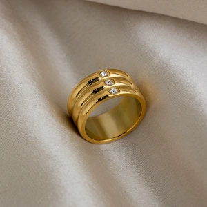 Minimalist 18K gold plated wide ring with three rows of zircons on champagne silk
