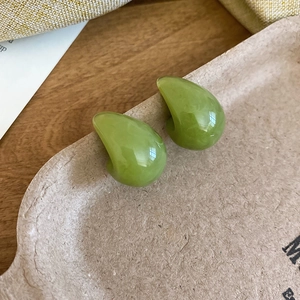 Minimalist green leaf-shaped resin stud earrings for a summer forest style look