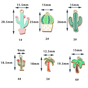 Enamel tropical plant charms set with cactus and palm tree designs in various sizes