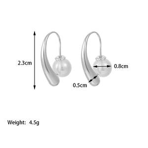Detailed view of silver teardrop earrings with dimensions 2.3cm and 0.8cm pearl charm