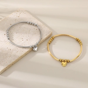 Elegant stainless steel heart pendant bangles with round beads for women