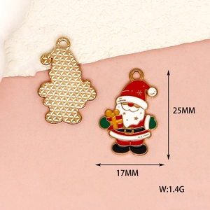 Macro detail view showing size and back of Santa Claus DIY enamel charm 25x17mm
