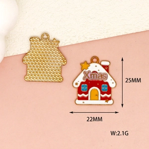 Detail view of 25x22mm Xmas house pendant showing front and back with 2.1g weight