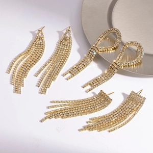 Sparkling gold-plated stainless steel tassel earrings with micro-pave rhinestones for women.