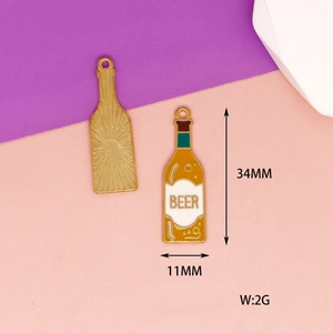 Detailed view of enamel beer bottle charm with dimensions 34x11mm for DIY jewelry