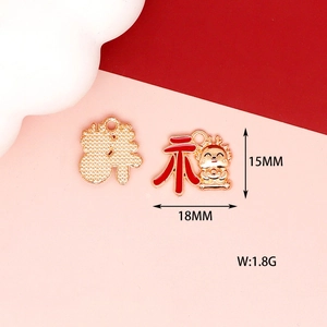 Detail view of golden dragon charm pendant with 18mm x 15mm size and 1.8g weight specs