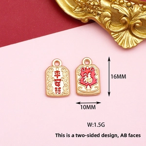 Detailed view of double-sided Chinese style alloy charm with Fortune and Safety text