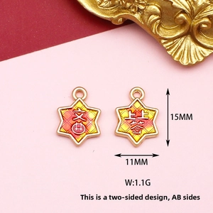 Detailed close-up of gold-plated alloy charm with double-sided Chinese characters