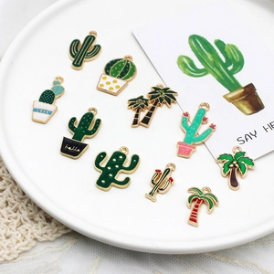 Collection of colorful cactus and palm tree enamel charms for DIY jewelry making