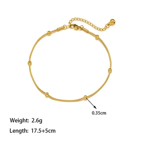 Détail d'un bracelet chaîne serpent à billes dorées avec spécifications de poids et taille