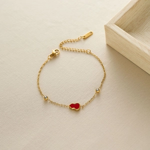 Bracelet en acier inoxydable doré avec pendentif gourde rouge et cristaux clairs
