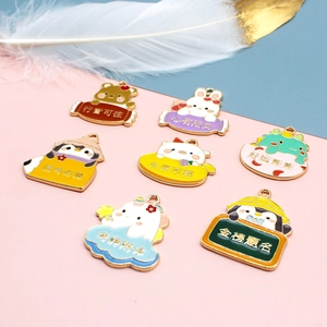 Macro view of various cartoon animal enamel pendants with encouraging Chinese text
