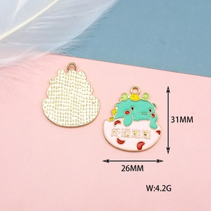 Detail view of cartoon dinosaur alloy pendant with 31mm and 26mm size measurements