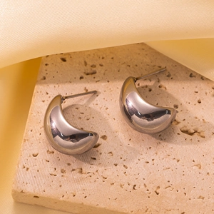 Minimalist C-shaped polished titanium steel earrings with a sleek mirror finish