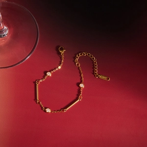 Detail view of a 316 stainless steel gold bracelet with sparkling cubic zircon