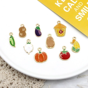 Detailed macro view of colorful vegetable alloy charms for creative DIY jewelry making