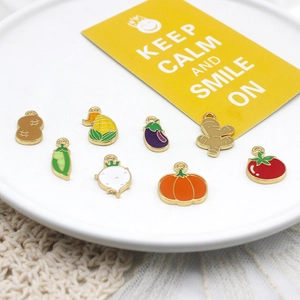 Detailed view of colorful vegetable alloy enamel charms for DIY jewelry making