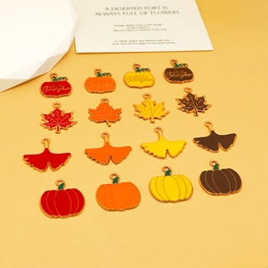 Autumn enamel charms with pumpkin, maple leaf, and ginkgo leaf designs for DIY jewelry