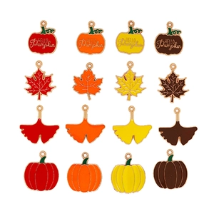 Assorted autumn-themed alloy enamel charms featuring pumpkins and various leaf designs