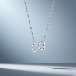 Polished silver double interlocking heart pendant necklace in titanium steel for women