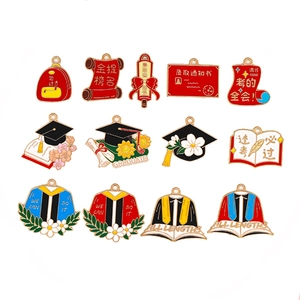 Colorful alloy oil drip graduation charms with scholar hats and academic scrolls