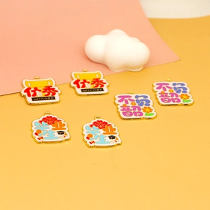 Detailed view of colorful alloy enamel charms with Chinese blessing characters