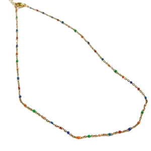Minimalist gold necklace with vibrant multicolor resin beads and secure lobster clasp