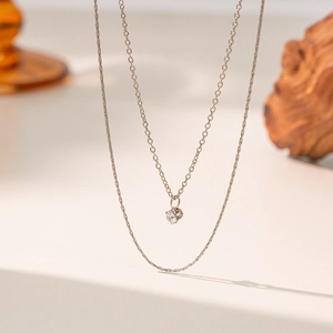 Double-layered silver titanium necklace with sparkling diamond pendant and snake chain