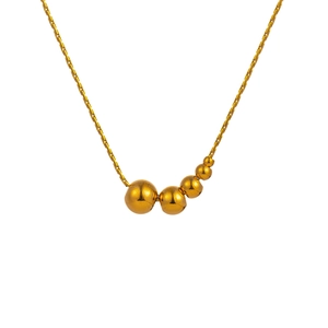 Minimalistische Goldene Perlenkette mit fünf abgestuften Kugeln an feiner Kette