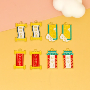 Detail showing various Chinese style alloy charms with traditional good luck motifs