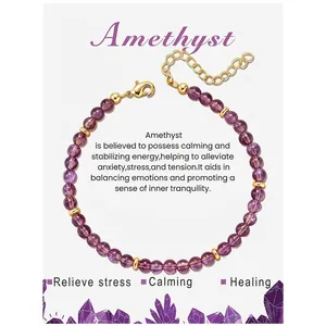Close-up of amethyst beaded bracelet with gold spacers and adjustable lobster clasp closure