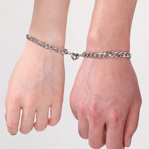 Stylish silver magnetic heart couple bracelets featuring durable stainless steel NK chain links