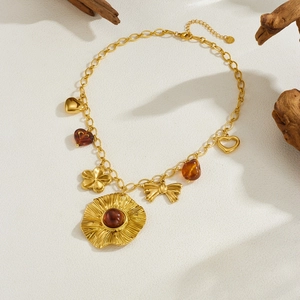 Vintage gold-plated stainless steel necklace with resin heart and bow charms