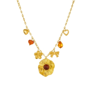 Gold plated stainless steel necklace with resin heart charms and bow pendant details