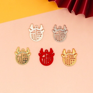 Close-up of five colorful alloy Chinese 'Fu' character charms for DIY jewelry