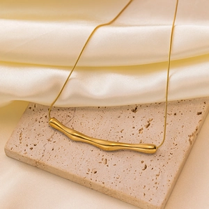 Irregular 18K gold plated titanium necklace with wavy liquid pendant and snake chain