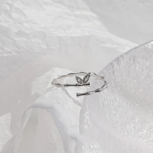 Minimalist bamboo leaf ring in 925 sterling silver with micro-pave diamond accents