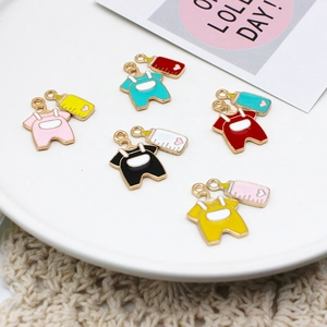 Macro view of colorful enamel baby bodysuit and nursing bottle alloy jewelry charms for DIY