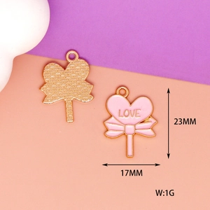 Close-up detail of pink heart lollipop alloy charm with LOVE text and 23mm height measurement