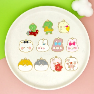 Variety of colorful enamel animal charms like rabbits and bears for DIY jewelry making.