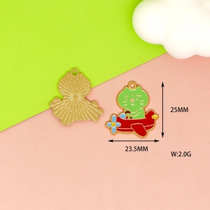 Close-up of cat pilot enamel pendant showing 25mm dimensions and front back views
