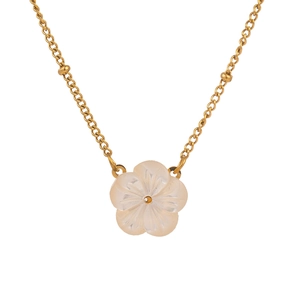 Close-up of titanium steel necklace with a delicate white shell peach blossom pendant