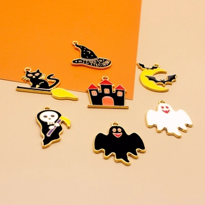 Selection of colorful Halloween charms including ghosts, bats and a wizard hat