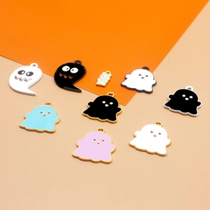 Variety of colorful Halloween enamel ghost pendants for DIY jewelry making crafts.