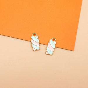 Close-up of pastel marshmallow charms featuring gold alloy base and colorful enamel