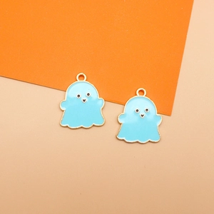 Detail view of two cute light blue enamel ghost charms for DIY Halloween jewelry