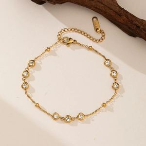 Minimalist titanium steel gold bracelet with sparkling clear round zircon accents