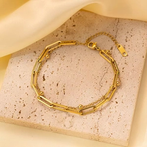 Double-layered gold stainless steel paperclip chain bracelet with delicate beads