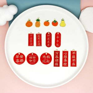 Collection of various red enamel good luck charms and fruit pendants for DIY jewelry making