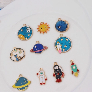 Golden enamel astronaut and planet charms set for DIY jewelry making accessories